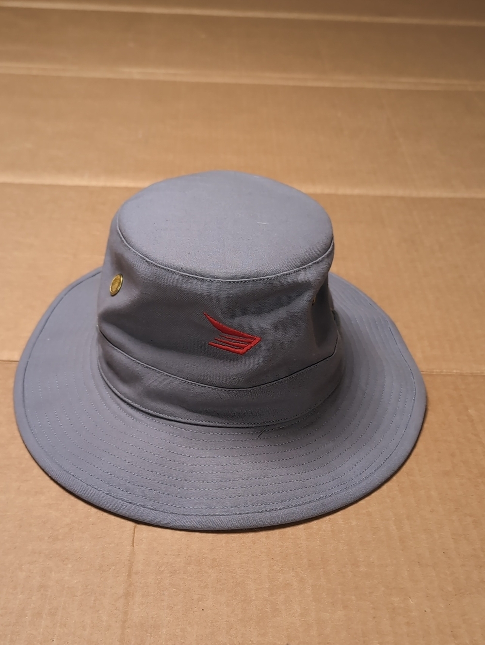 Gray Bucket Hat with Red Embroidered Logo